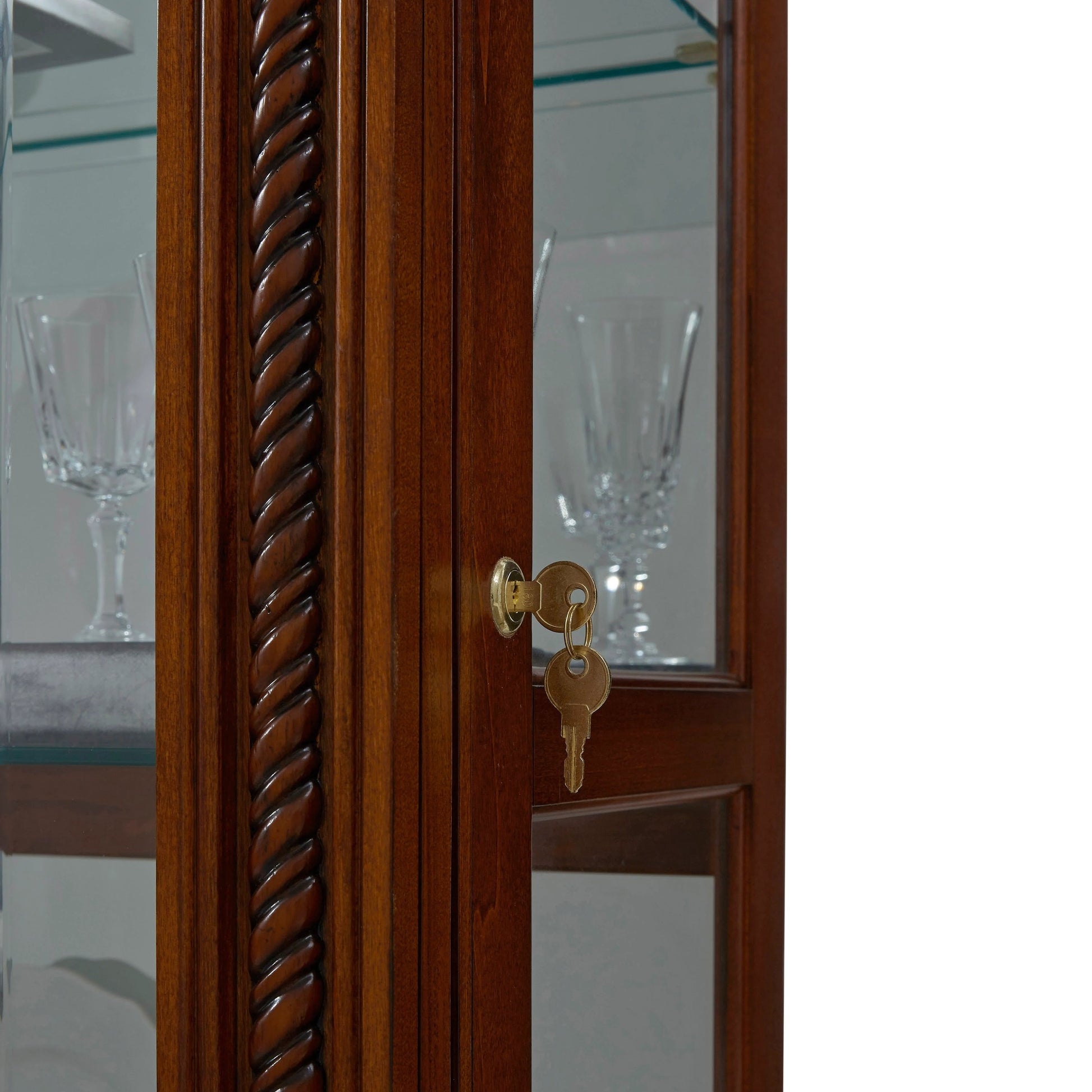 43'' Wide Medallion Cherry Curio Display Cabinet by Pulaski Furniture in rich cherry. Made from hardwood solids in a traditional style.