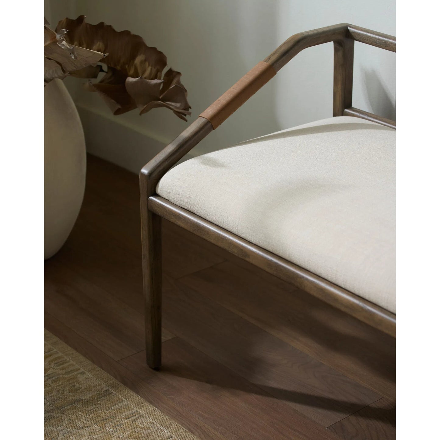 004 SI-2379482 | Closeup | Atra Bench by Becki Owens x Surya in light beige, brown. Made from polyester, linen, red oak, leather wrapped, polyester wrapped foam in a rustic style.