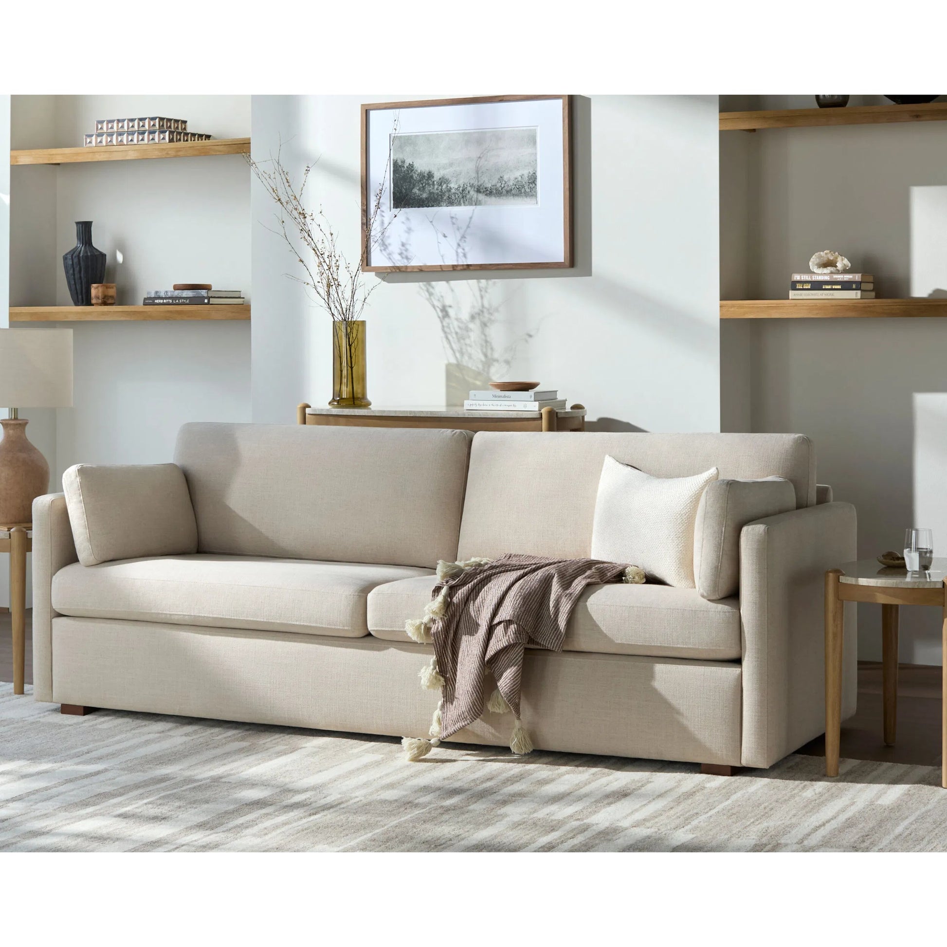 Elmar Sofa by Becki Owens x Surya in beige and ash. Made from polyester, plywood, foam, dacron in a transitional style.