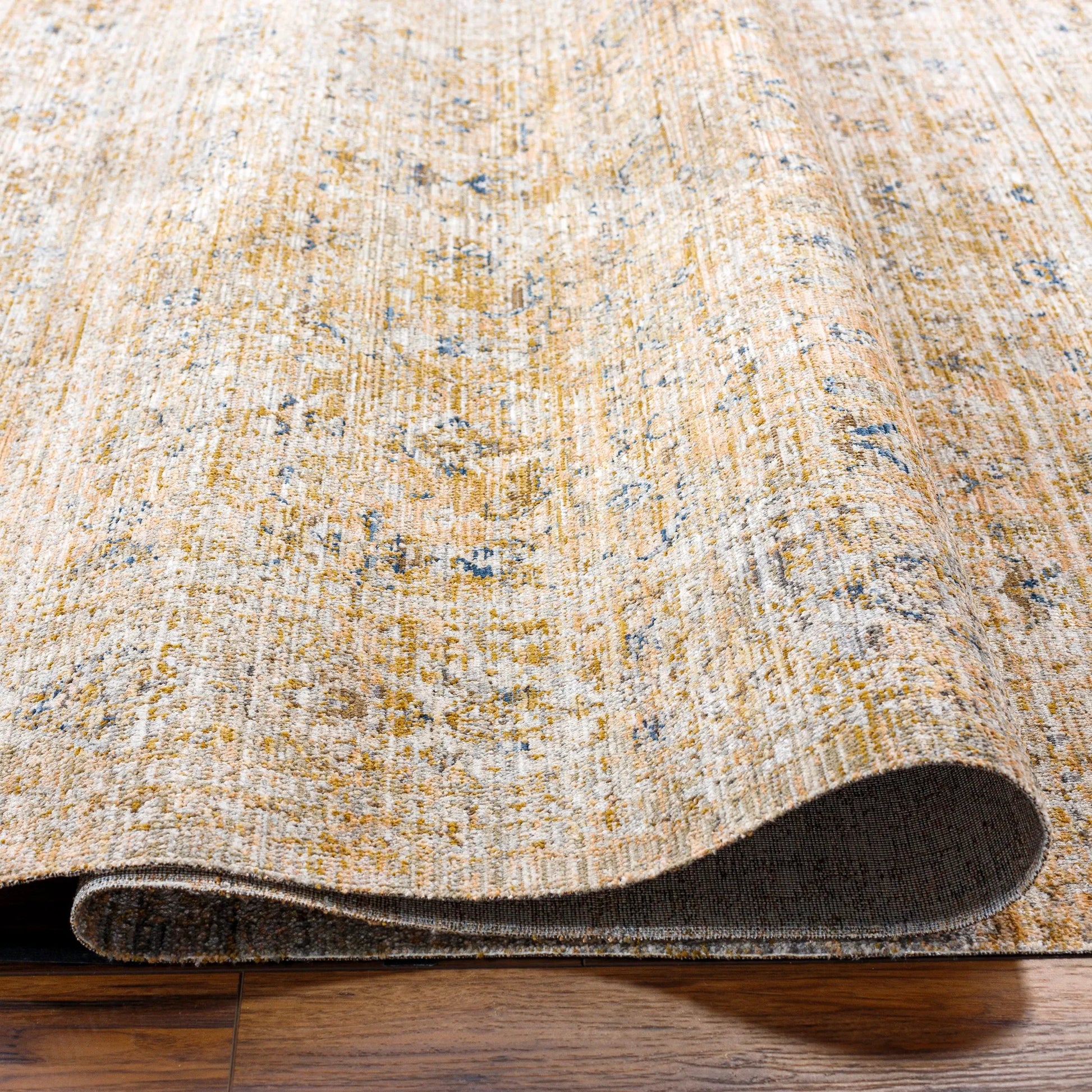 Margaret Rug - 490283 by Becki Owens x Livabliss in brown, gray, medium brown, taupe, blue. Made from face: 100% polyester, warp: 100% polypropylene in a unique style.