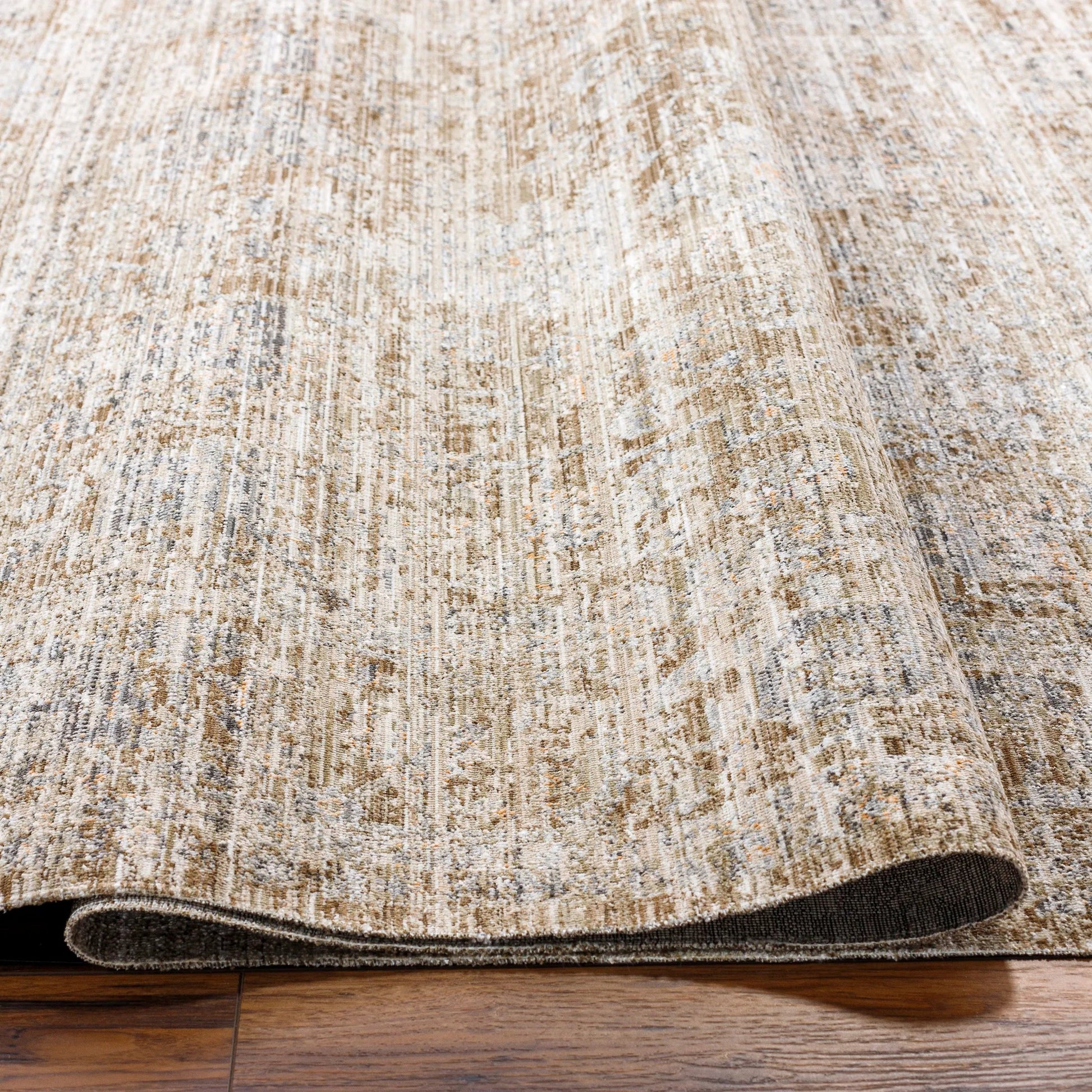 Margaret Rug - 490290 by Becki Owens x Livabliss in taupe, dark brown, gray, charcoal, brown. Made from face: 100% polyester, warp: 100% polypropylene in a unique style.