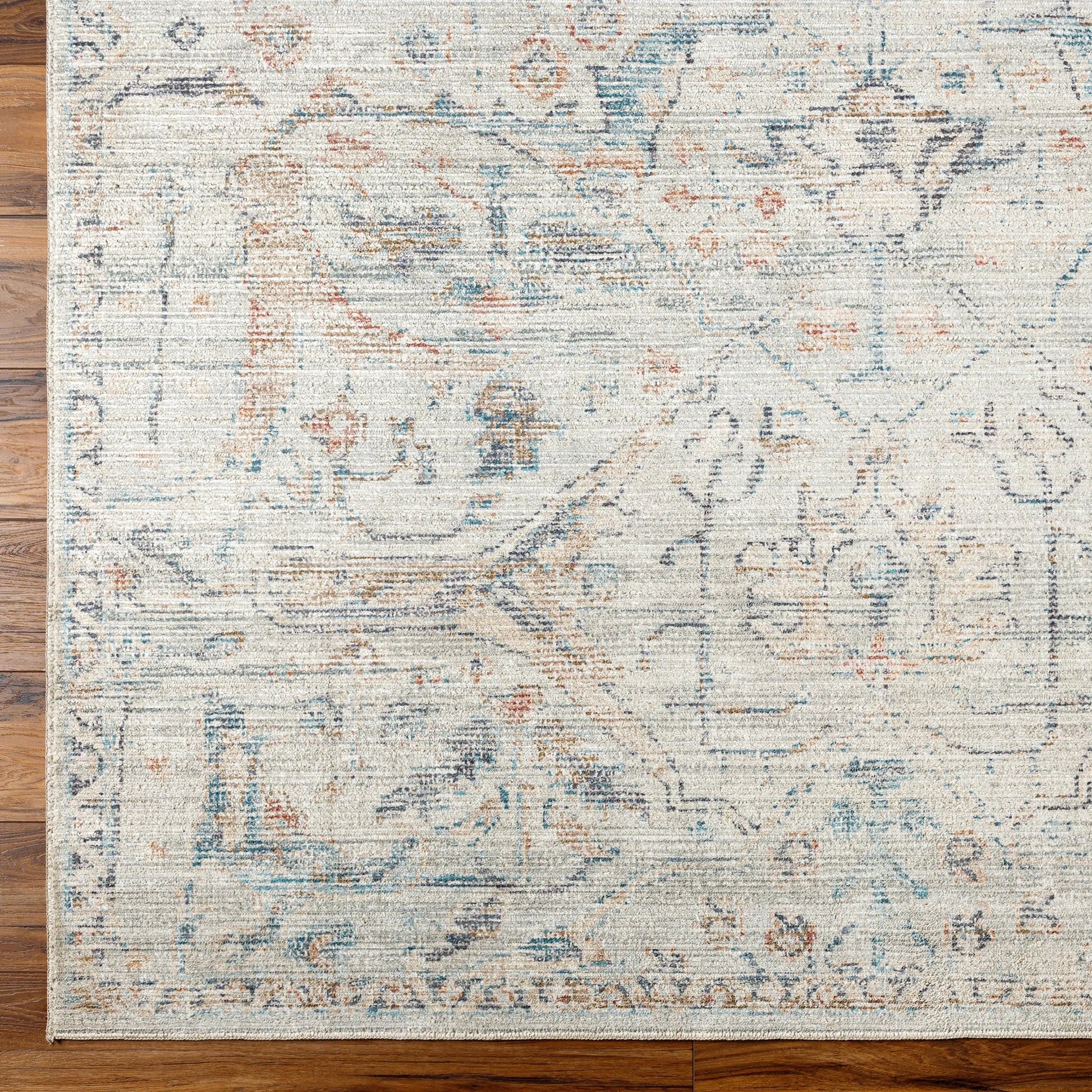Marlene Rug - 490121 by Becki Owens x Livabliss in cream, pale blue, light blue, olive, rust, black. Made from face: 100% polyester, warp: 100% cotton i