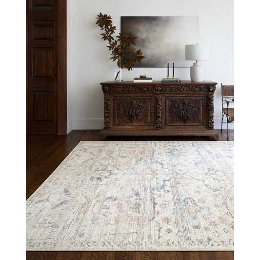 Marlene Rug - 490121 by Becki Owens x Livabliss in cream, pale blue, light blue, olive, rust, black. Made from face: 100% polyester, warp: 100% cotton