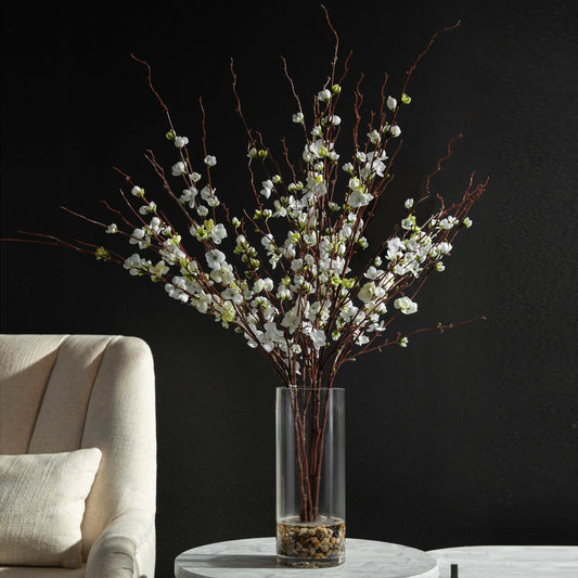 Quince Blossoms Silk Centerpiece by Uttermost. Made from silk, glass, acrylic, rocks in a modern style.
