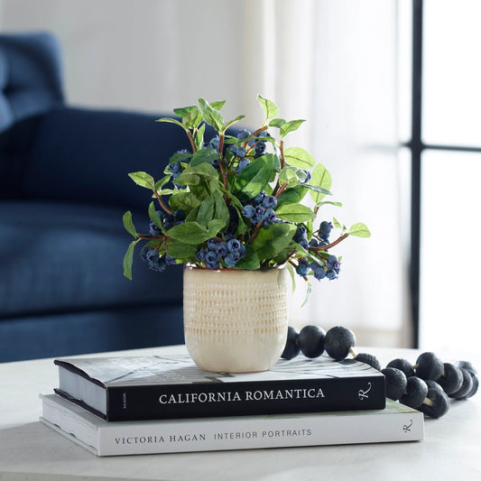 Blueberry Fields Accent by Uttermost in tan. Made from polyester, plastic, ceramic, glue, iron in a modern style.