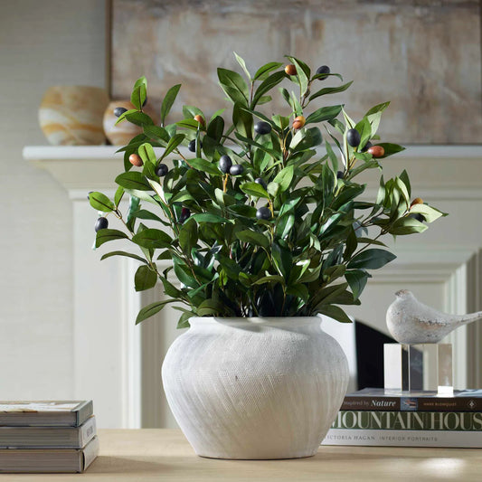 Elena Olive Centerpiece by Uttermost in green. Made from fabric, ceramic, foam, natural moss in a transitional style.