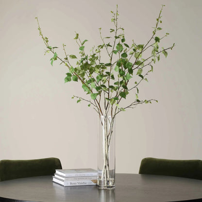 Nigra Birch Vase Centerpiece by Uttermost in clear. Made from polyester, plastic, glass in a transitional style.