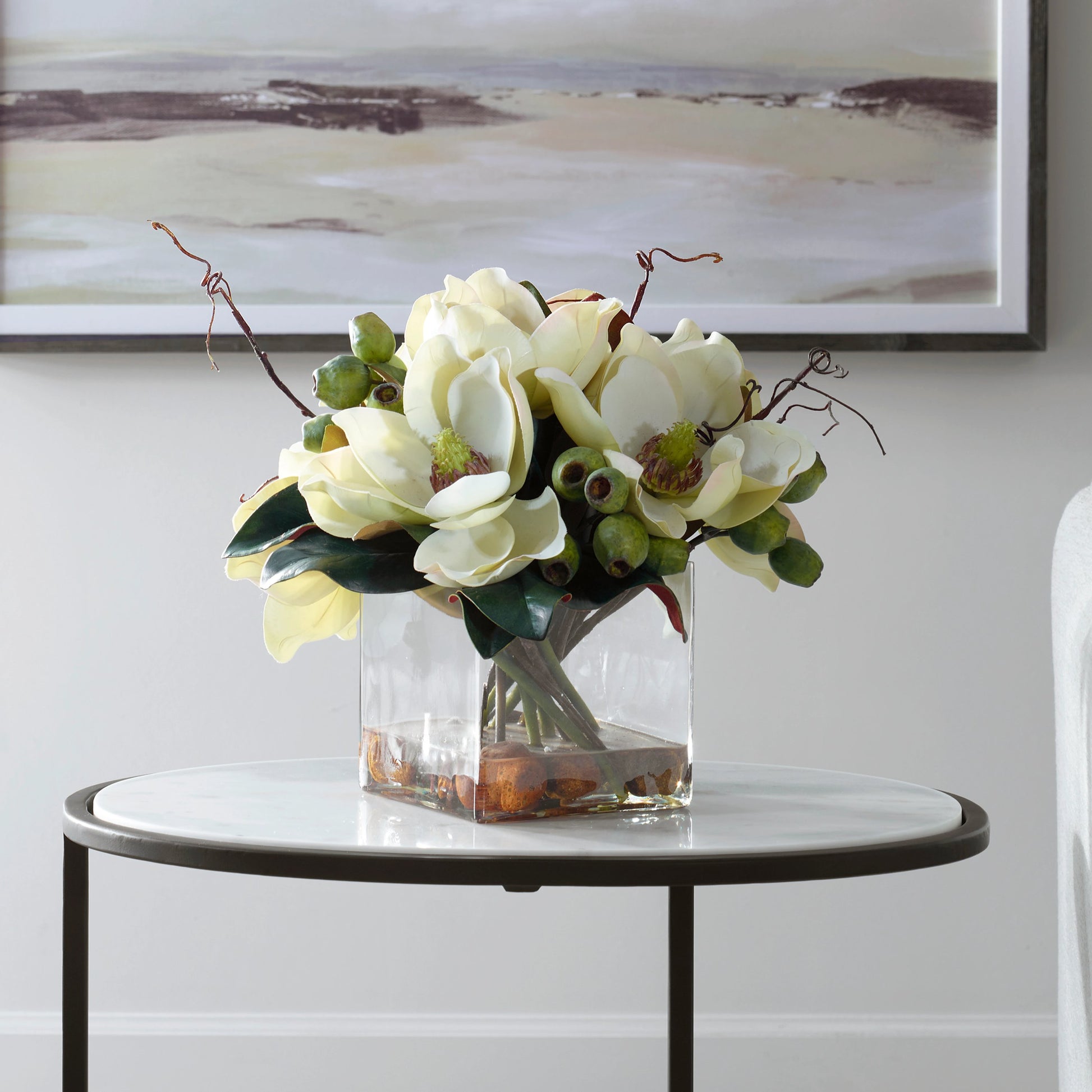Dobbins Magnolia Bouquet by Uttermost. Made from polyfoam, plastic, stone, iron, glass in a modern style.