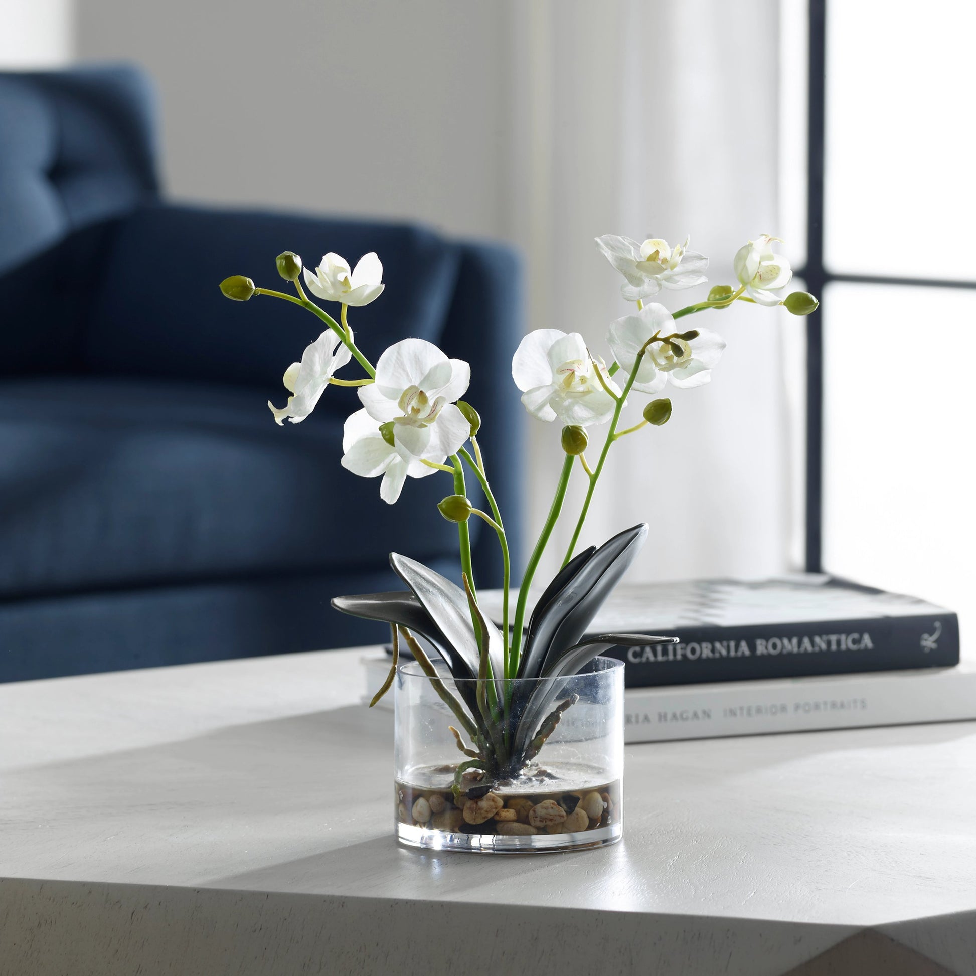 Glory Orchid by Uttermost in white. Made from polyester, plastic, iron, stone, glass in a modern style.