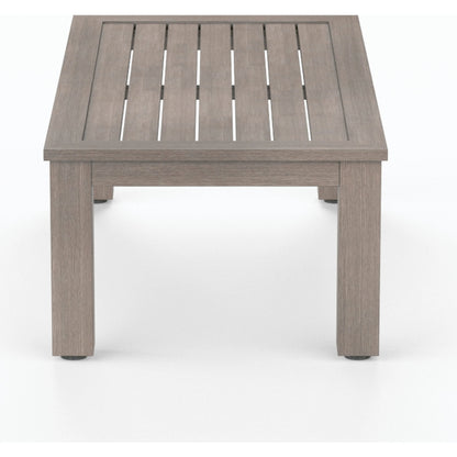 Laguna Outdoor Coffee Table by Sunset West in driftwood. Made from aluminum in a modern style.