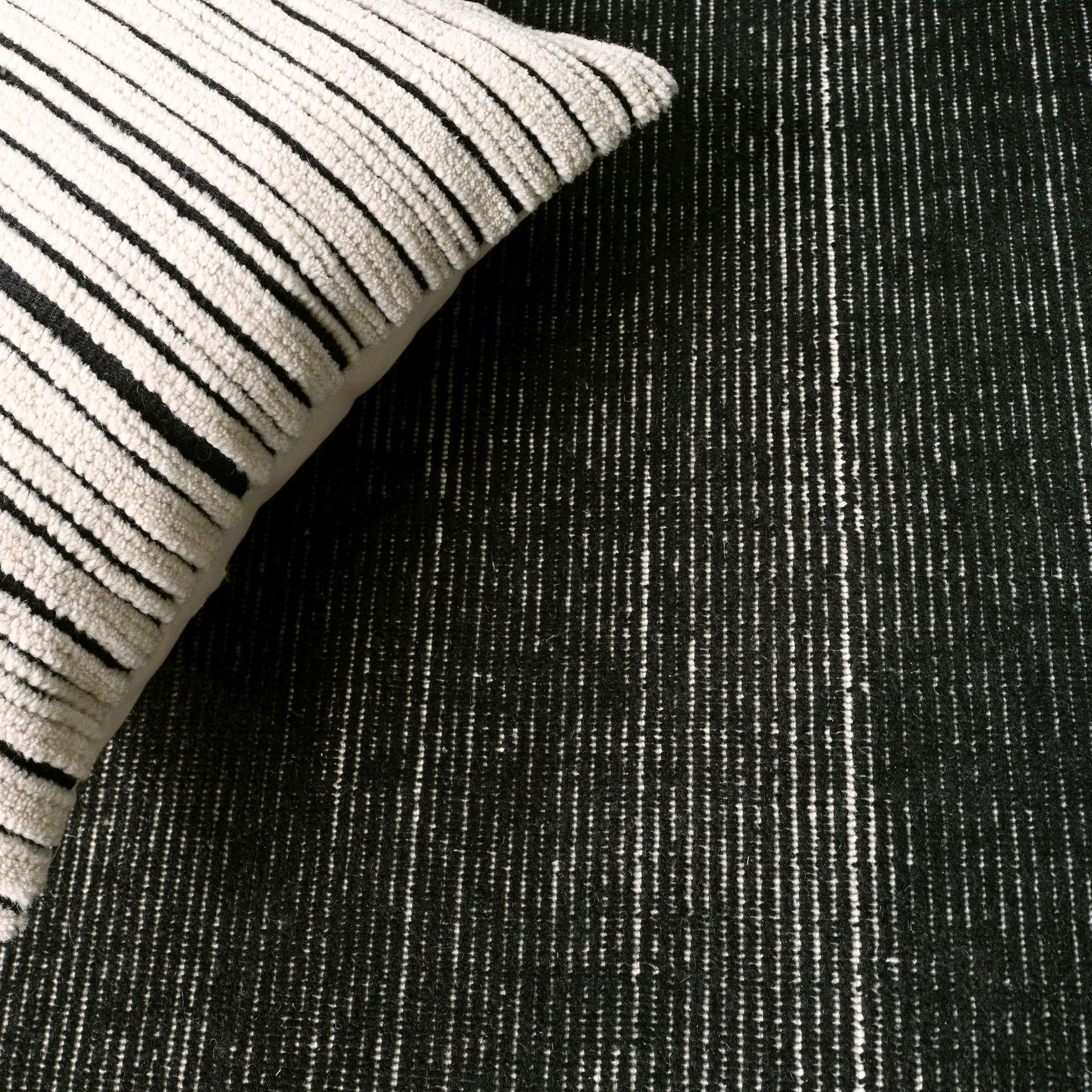 Brevin BRV11 Indoor/Outdoor Rug by Jaipur Living in black. Made from 100% pet yarn in a unique style.