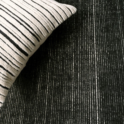 Brevin BRV11 Indoor/Outdoor Rug by Jaipur Living in black. Made from 100% pet yarn in a unique style.