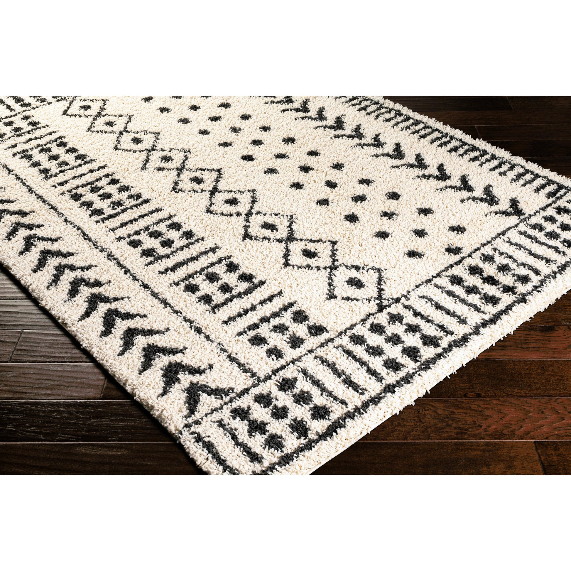 Beni BSH-2305 Shag Rug by Livabliss in black, cream. Made from 100% polypropylene in a traditional style.