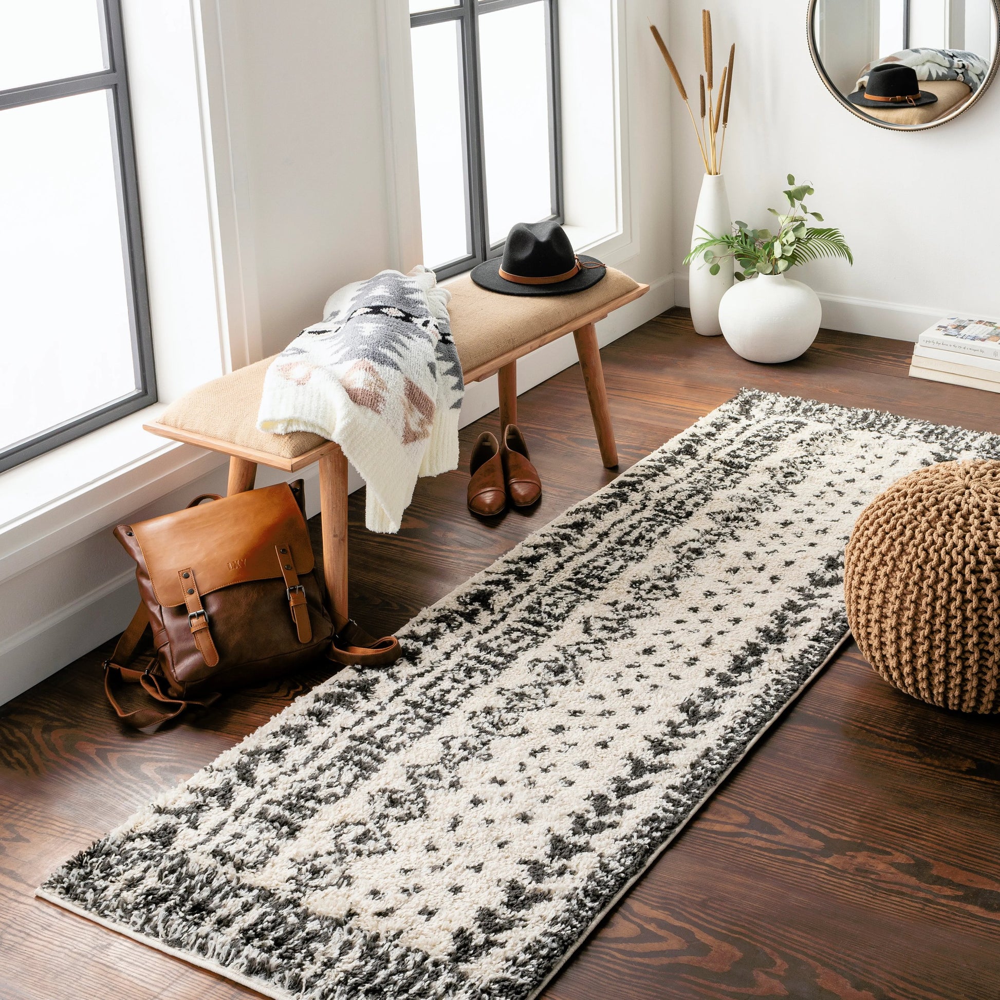 Beni BSH-2305 Shag Rug by Livabliss in black, cream. Made from 100% polypropylene in a traditional style.