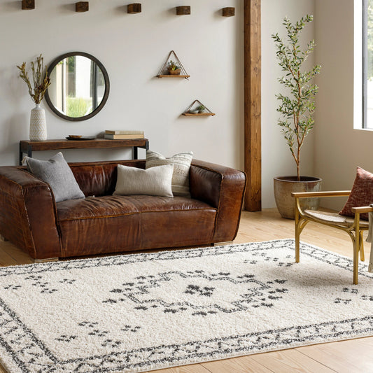 Beni BSH-2320 Shag Rug by Livabliss in black, cream. Made from 100% polypropylene in a traditional style.
