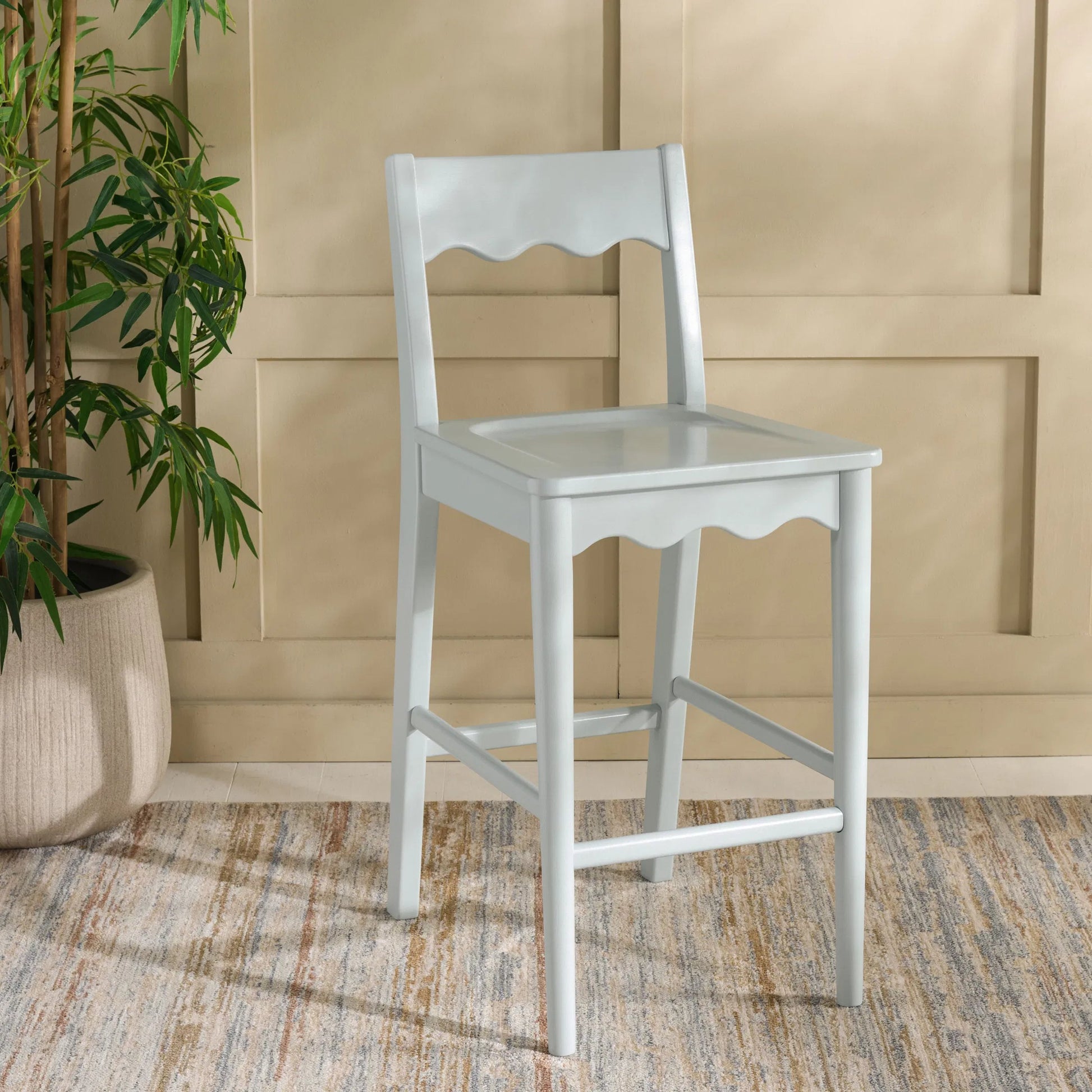 Newark Scallop Counter Stool by HedgeApple Essentials. Made from rubberwood in a unique style.