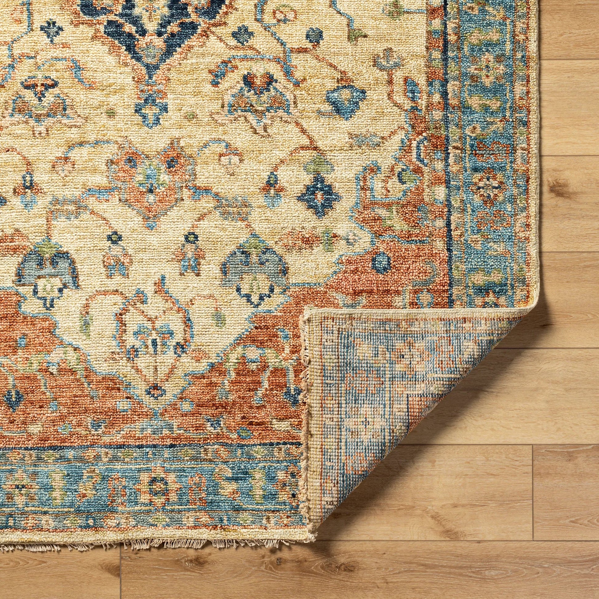 Biscayne Rug - 23597 by Surya in rust, aqua, ivory, grass green, brown. Made from 100% new zealand wool in a unique style.