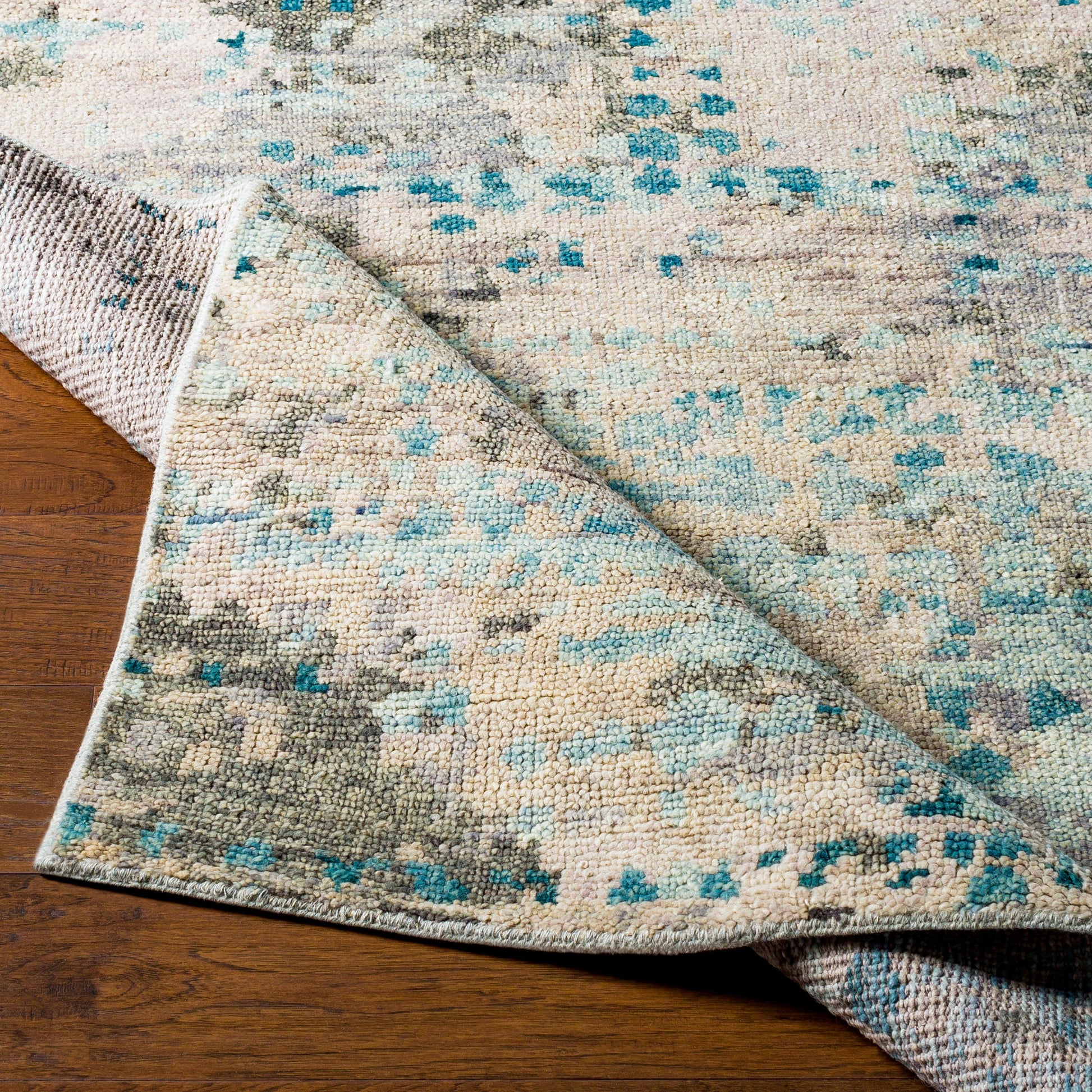 Biscayne Rug by Surya in deep teal, sage, medium green, dusty sage, charcoal. Made from 100% new zealand wool in a modern style.