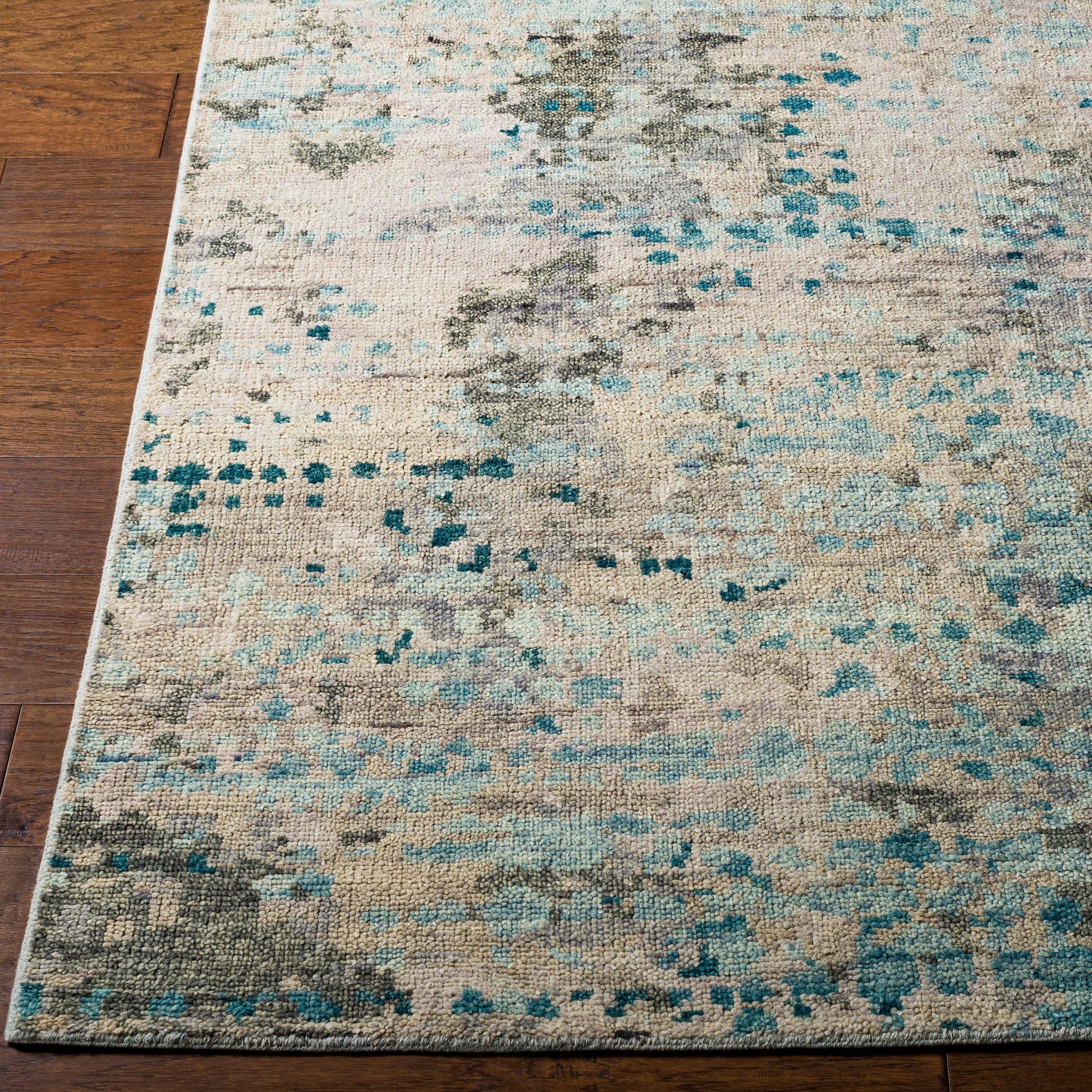Biscayne Rug by Surya in deep teal, sage, medium green, dusty sage, charcoal. Made from 100% new zealand wool in a modern style.