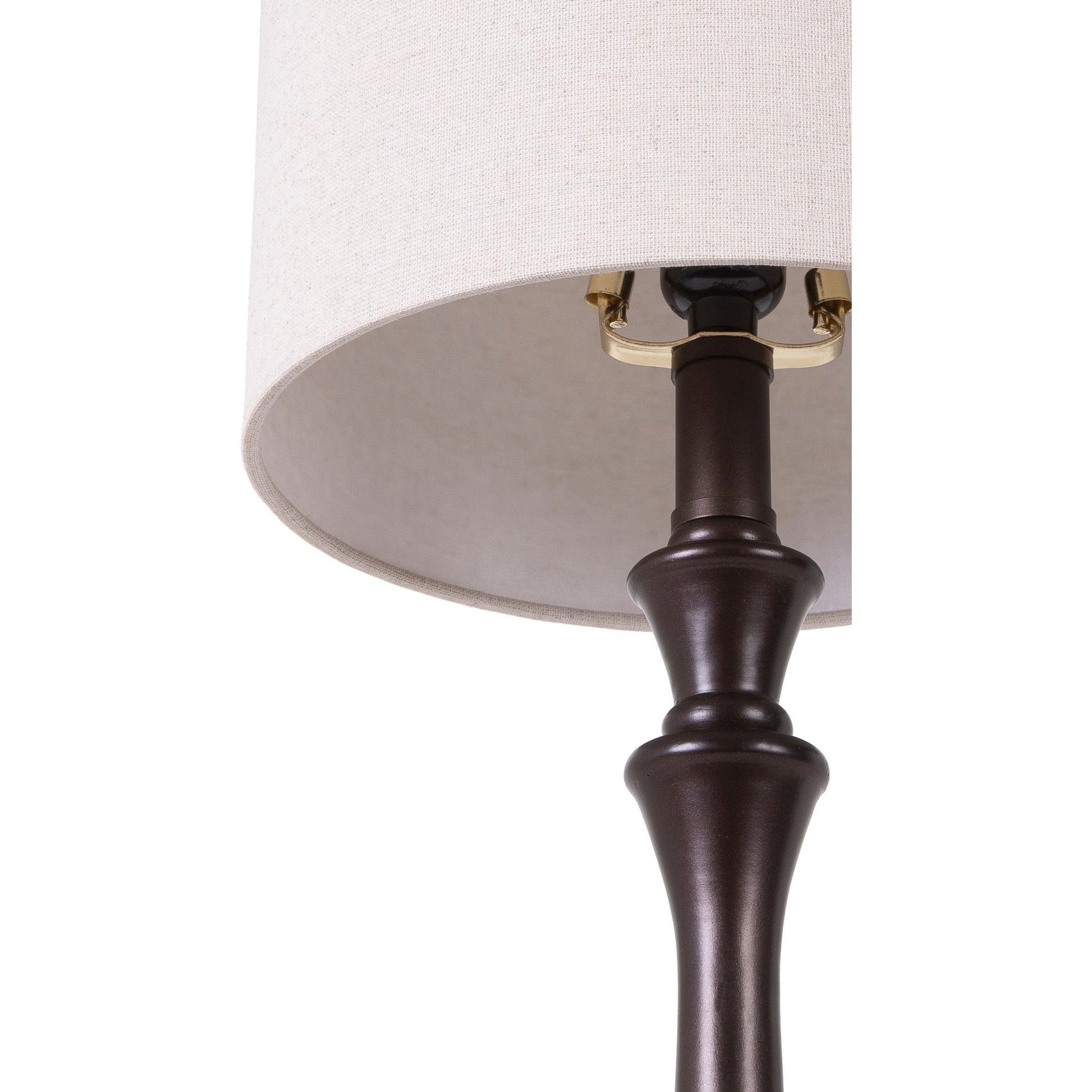 Bettiny Table Lamp- 31877 by Livabliss in black. Made from shade (outside): linen, shade (inside): polyester, base: composition, finial: metal, harp: metal in a traditional style.