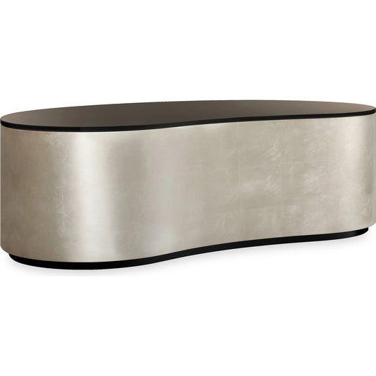 Adele Cocktail Table by Caracole in charcoal leaf, almost black. Made from asian hardwood, glass in a unique style.