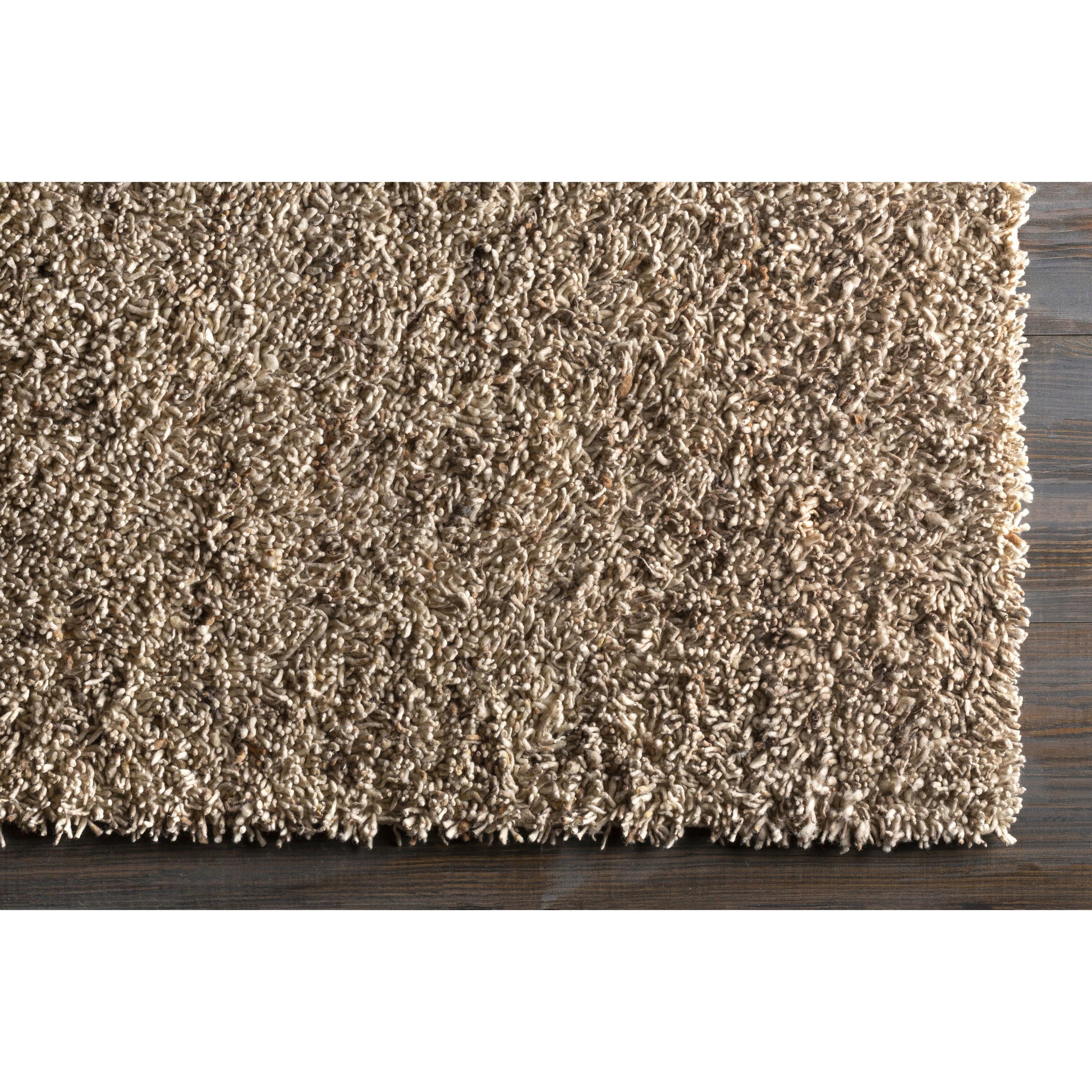 Bexley Rug - 23167 by Surya in brown, dark brown, cream. Made from 100% wool - felted in a unique style.