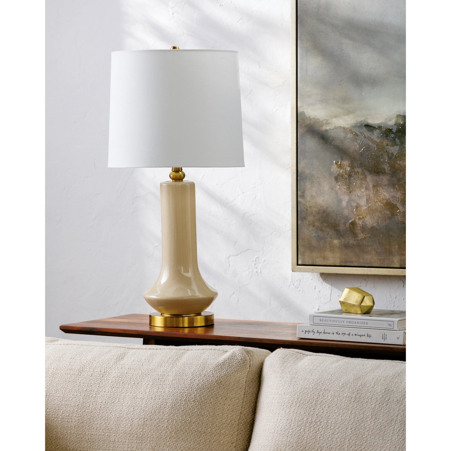 002 SI-2165019 | Lifestyle | Bozrah Accent Table Lamp - 533189 by Livabliss in body: cream, base: gold, shade: white, finial: metallic - gold, harp: metallic - gold, cord: translucent and plateddistressedplated. Made from ceramic, iron, linen, polyester in