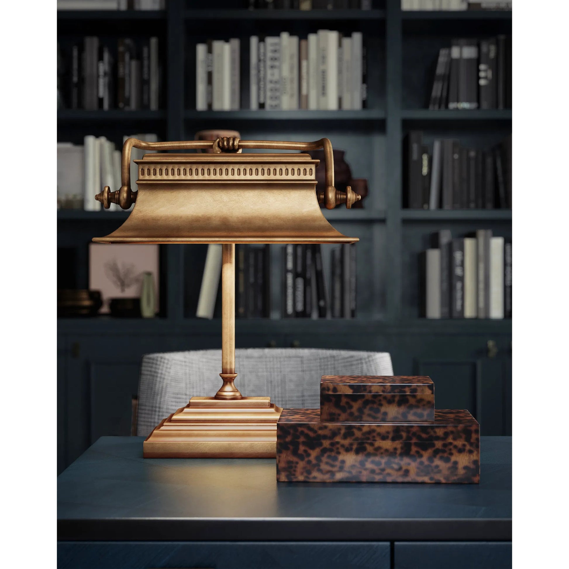 Malvasia Desk Lamp by Currey and Company in vintage brass. Made from brass in a traditional style.