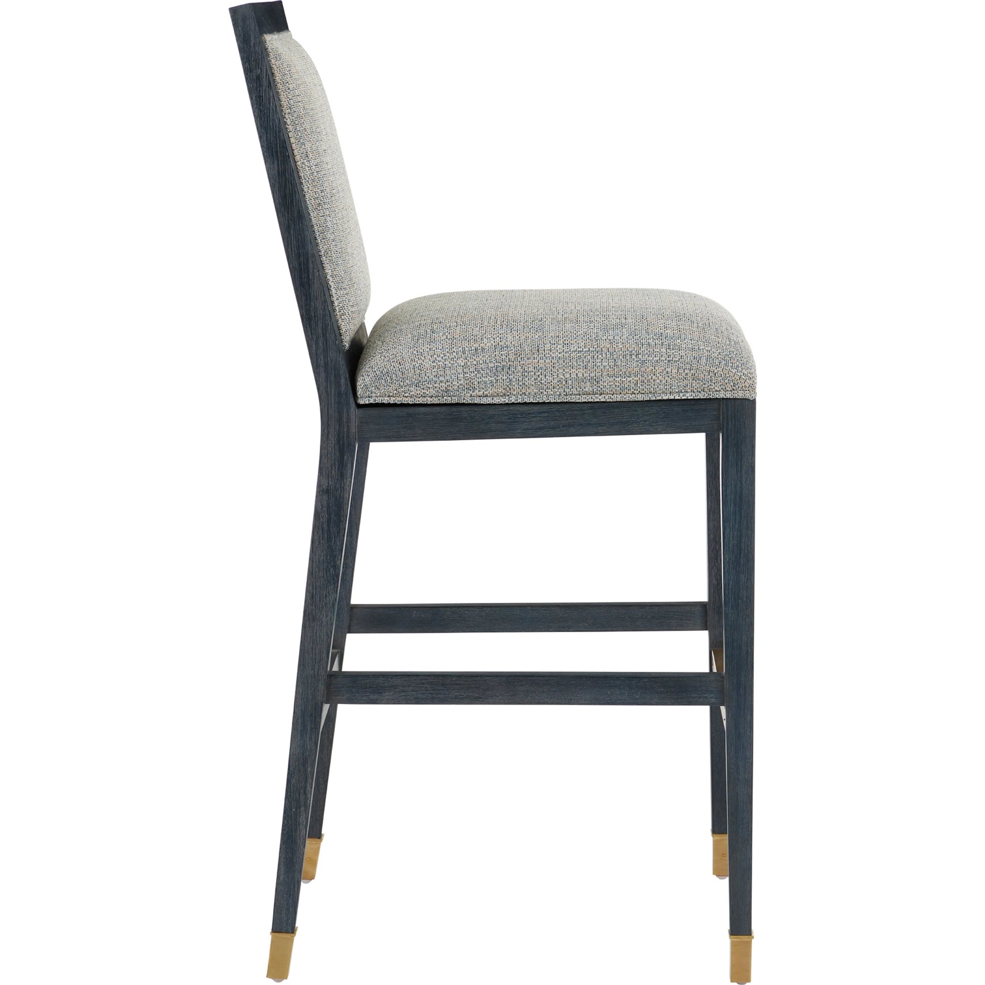 Santos Bar Stool by Currey and Company. Made from mahogany, rattan, brass in a modern style.