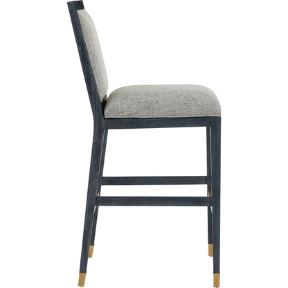 Santos Bar Stool by Currey and Company. Made from mahogany, rattan, brass in a modern style.