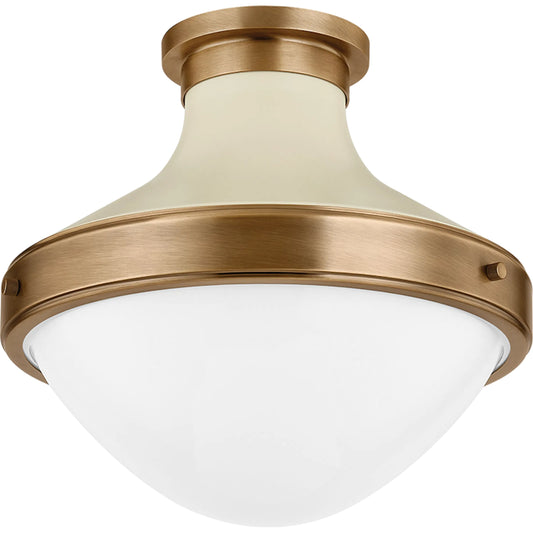 Maxton Flush Mount by Troy in patina brass and soft sand. Made from steel in a unique style.