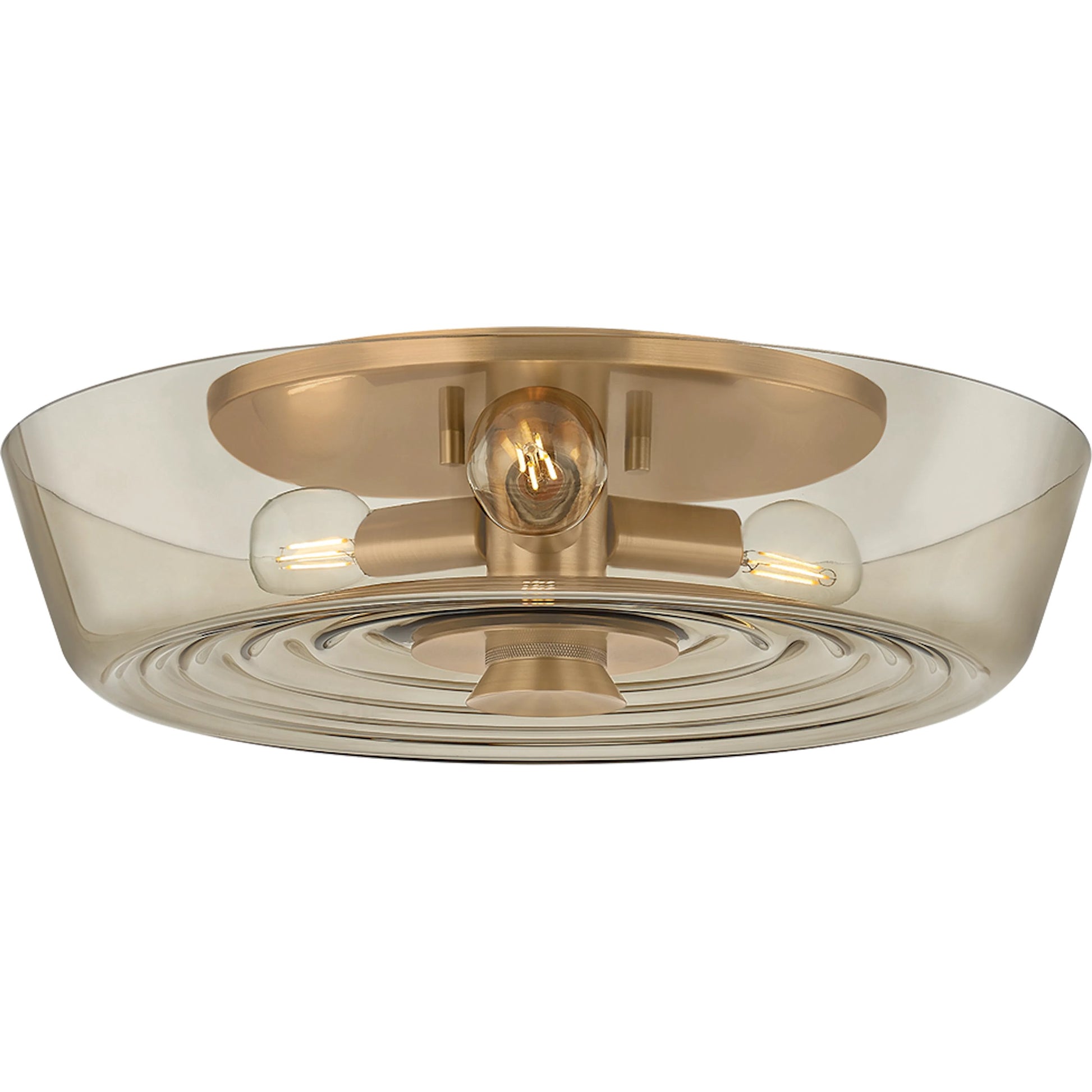 Theodore Flush Mount by Troy in patina brass. Made from clear textured glass, glass in a unique style.