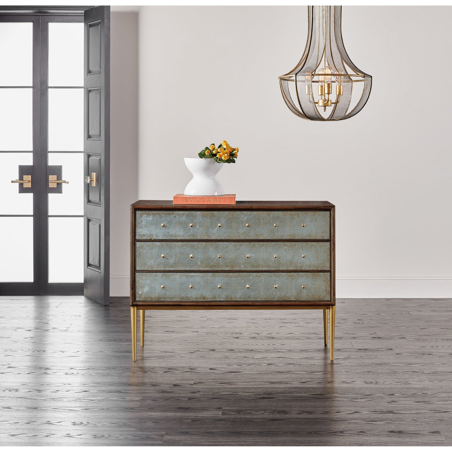 003 SI-1873146 | Lifestyle | Melange Estrella Three Drawer Chest by Hooker Furniture in dark wood. Made from swirl mahogany with glass, metal in a transitional style.