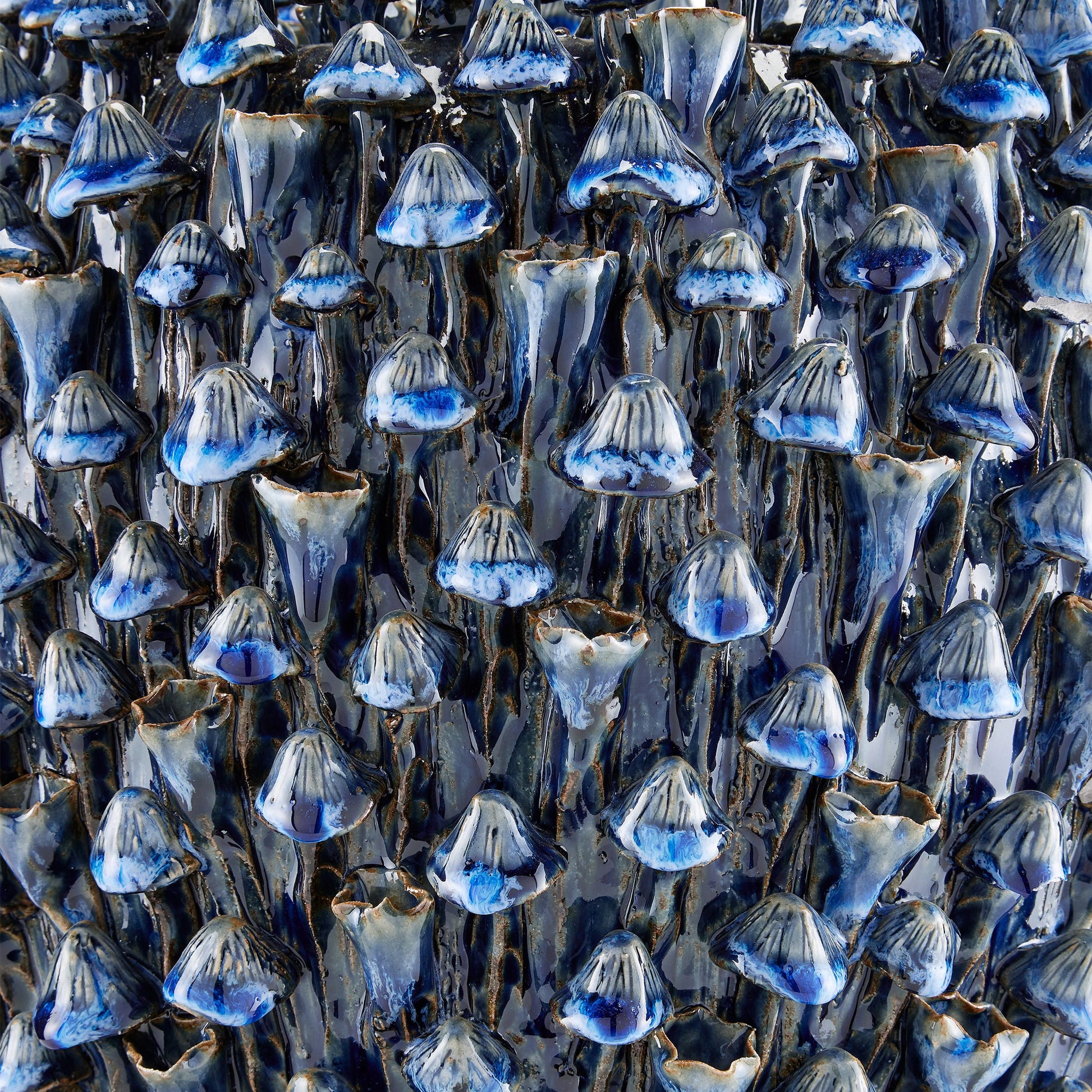 Manitapi Blue Vase by Currey and Company in blue. Made from ceramic in a coastal style.