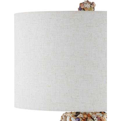 Festoon Table Lamp by Currey and Company in natural, sugar white. Made from assorted shells, wood, wrought iron in a modern style.