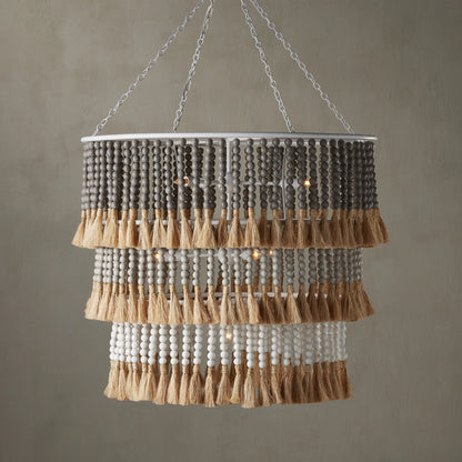 St. Barts Chandelier by Currey and Company in mist blue, demin blue. Made from wrought iron, wood beads, abaca rope in a coastal style.
