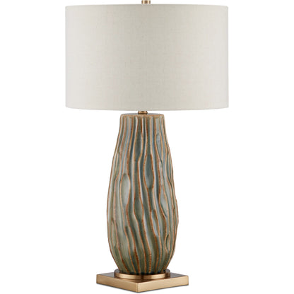 Water-Borne Table Lamp by Currey and Company in forest reactive, antique brass. Made from ceramic, metal in a modern style.