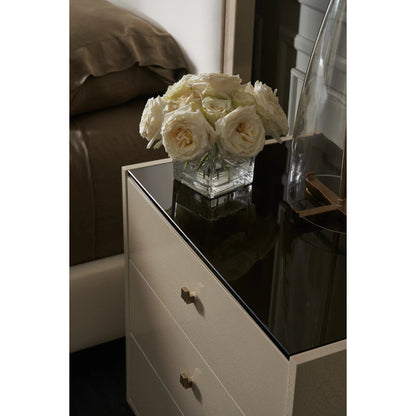 Iliad Nightstand by Caracole in ivory, smoked, bronze, gold and ivory craze, brushed gold paint. Made from poplar, koto, glass in a unique style.
