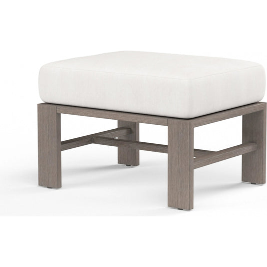Laguna Outdoor Ottoman by Sunset West in driftwood. Made from aluminum in a modern style.