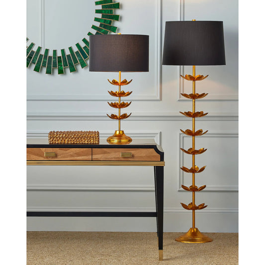 Awakening Table Lamp by Currey and Company in gold leaf. Made from metal in a modern style.