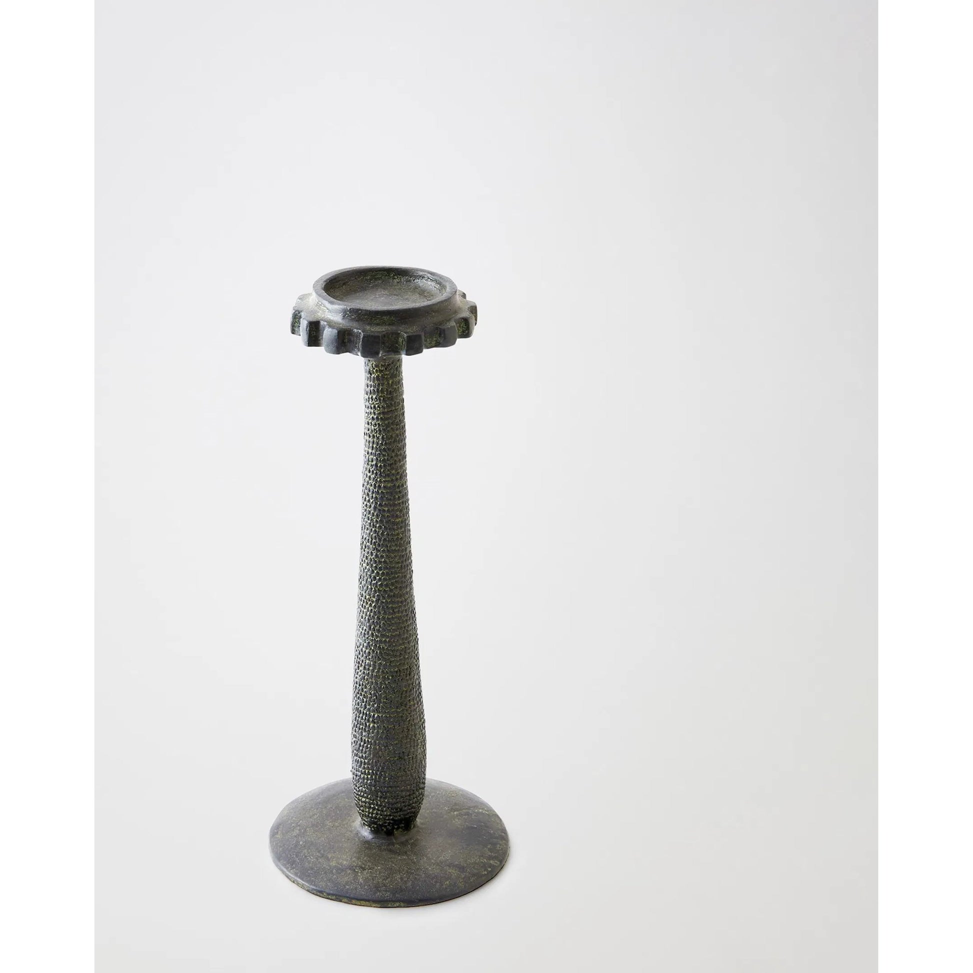 Totem Candlestick by Global Views in verdigris. Made from cast iron in a rustic style.