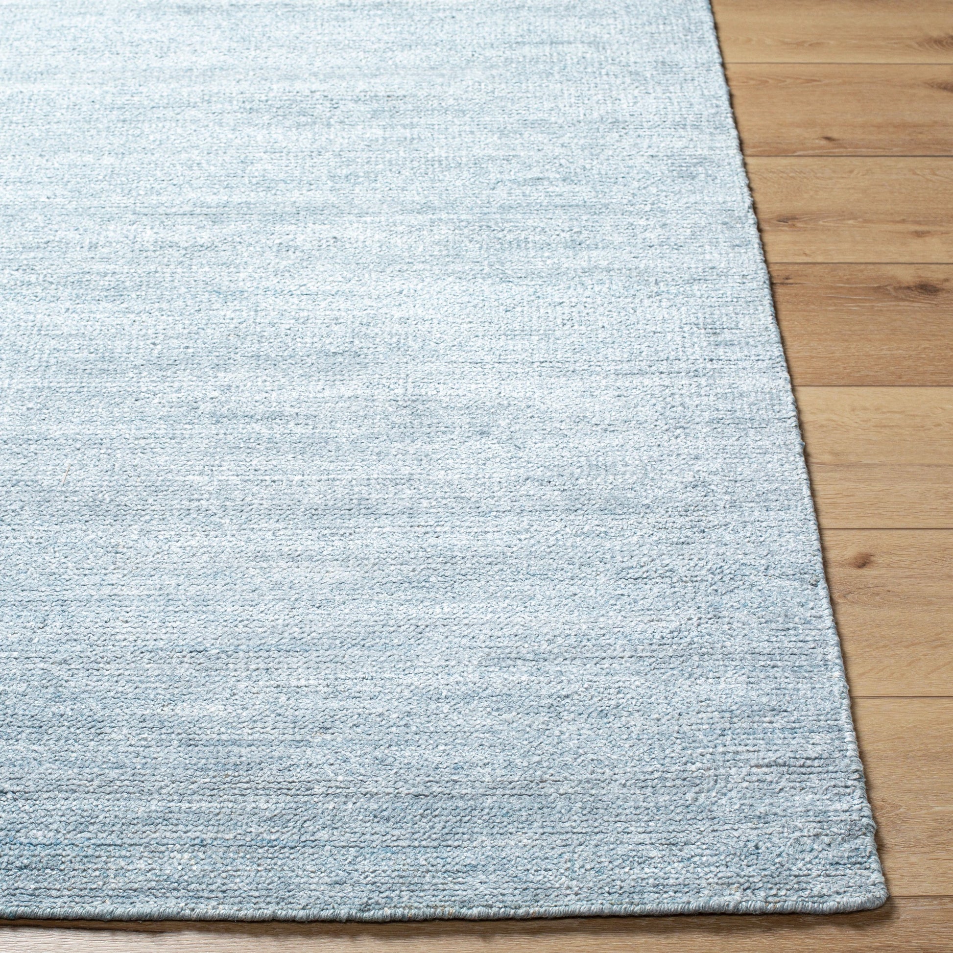 Calm CAM-2300 Rug by Surya in pale blue. Made from 100% viscose in a unique style.