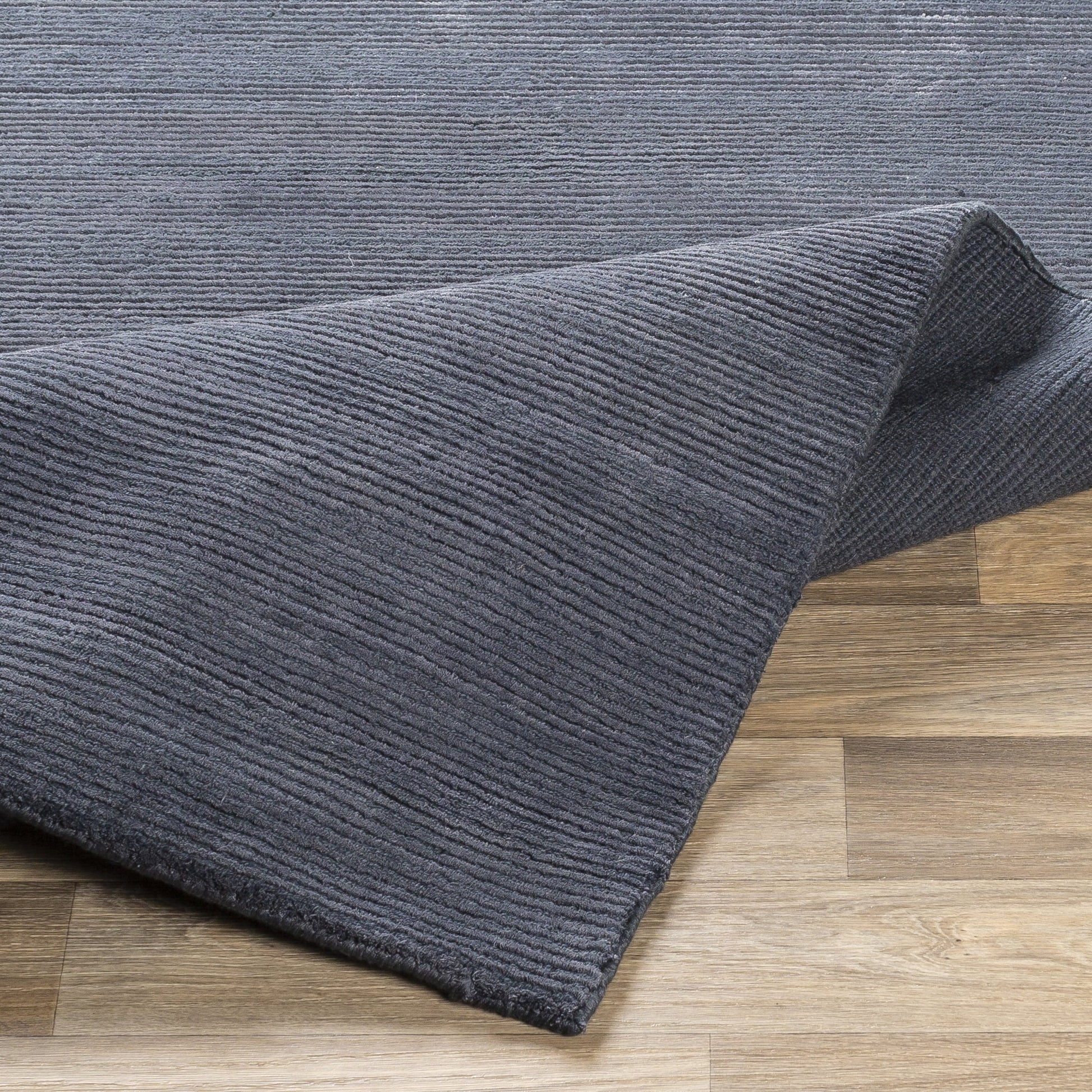 Capri CAP-2300 Rug by Surya in dark blue. Made from 60% viscose, 40% wool in a unique style.