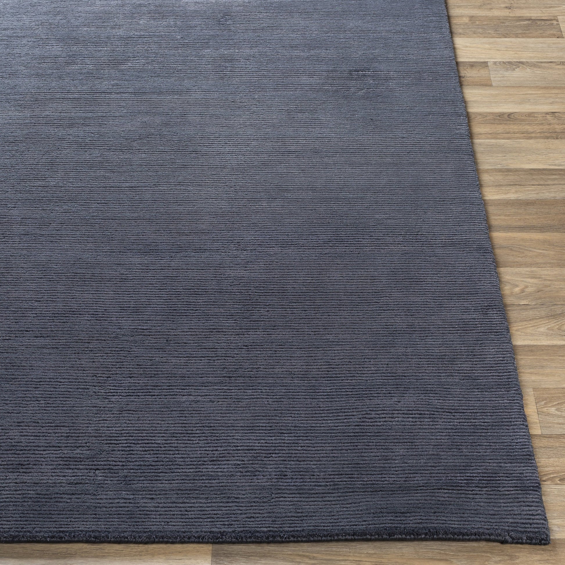 Capri CAP-2300 Rug by Surya in dark blue. Made from 60% viscose, 40% wool in a unique style.