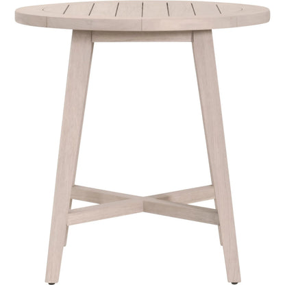 Carmel Outdoor 36" Round Counter Table by Essentials For Living in washed ever teak. Made from solid teak wood in a transitional style.