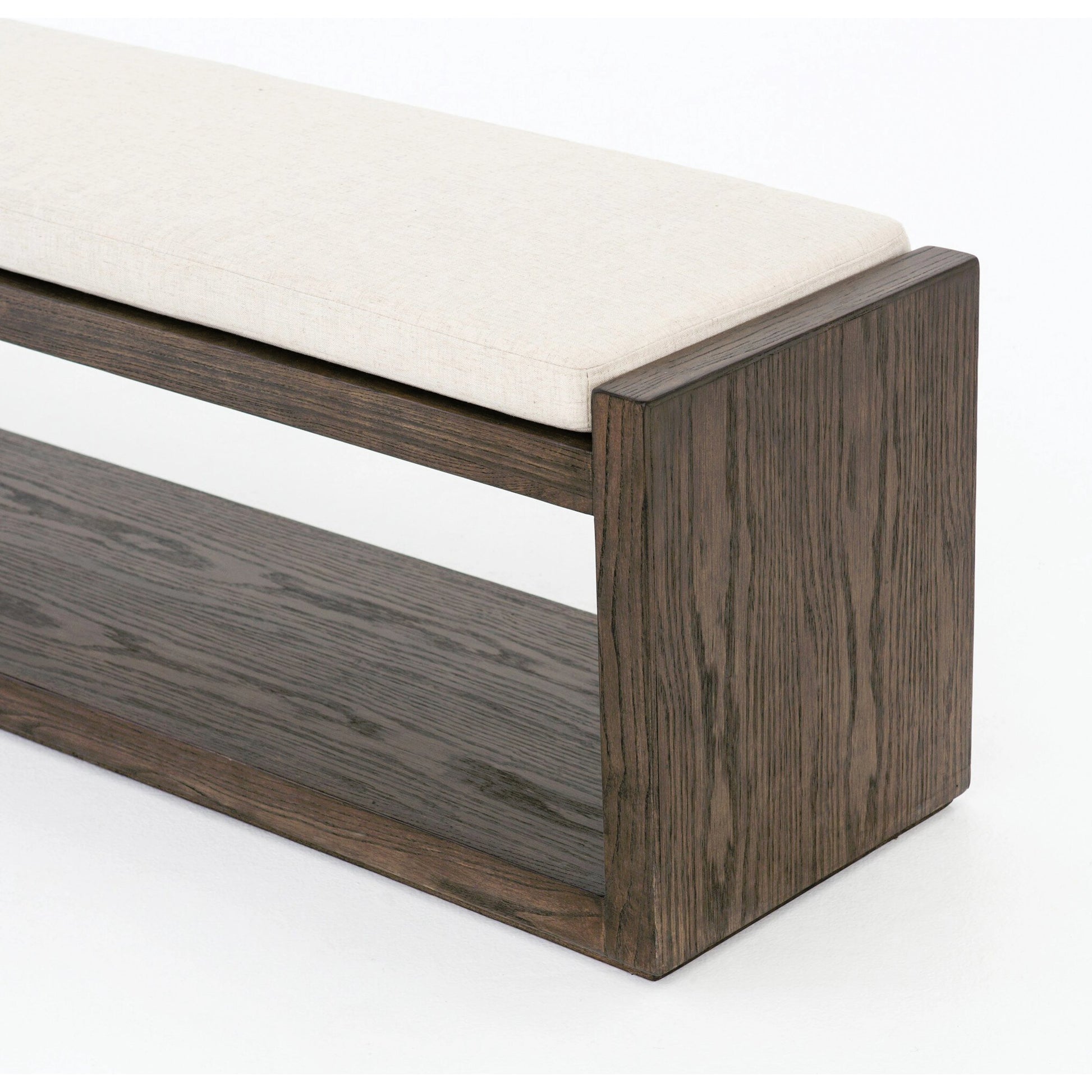 Edmon Bench by Four Hands in savile flax, warm oak. Made from 92% polyester, 8% flax, linen, solid nettlewood, 93% polyurethane foam pad, 7% polyester fiber batting in a modern style.