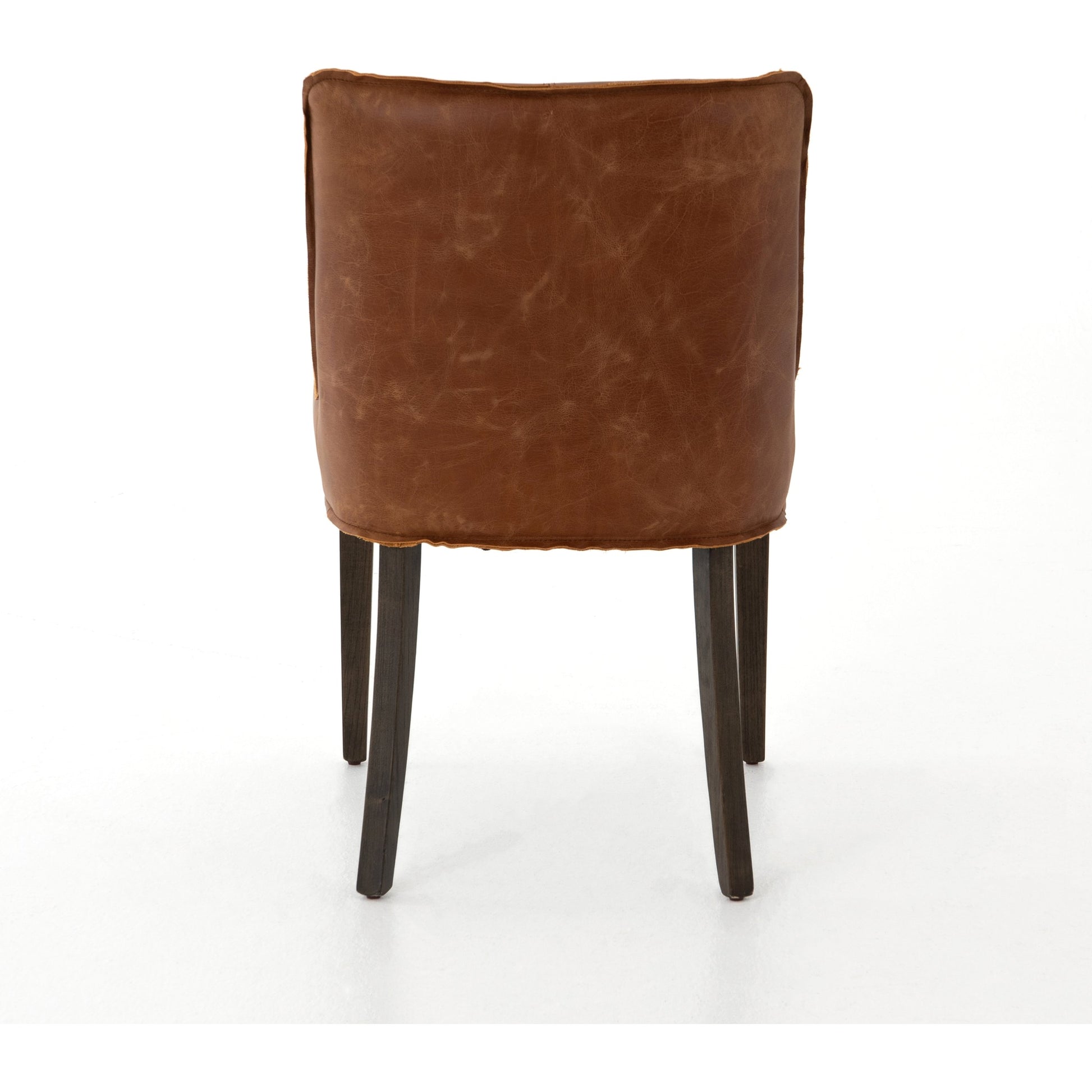 Aria Dining Chair by Four Hands in sienna chestnut, warm nettlewood and sienna chestnut. Made from top grain leather, solid nettlewood, 100% polyester in a modern style.