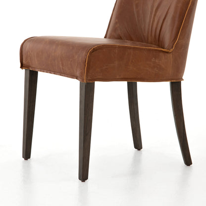 Aria Dining Chair by Four Hands in sienna chestnut, warm nettlewood and sienna chestnut. Made from top grain leather, solid nettlewood, 100% polyester in a modern style.