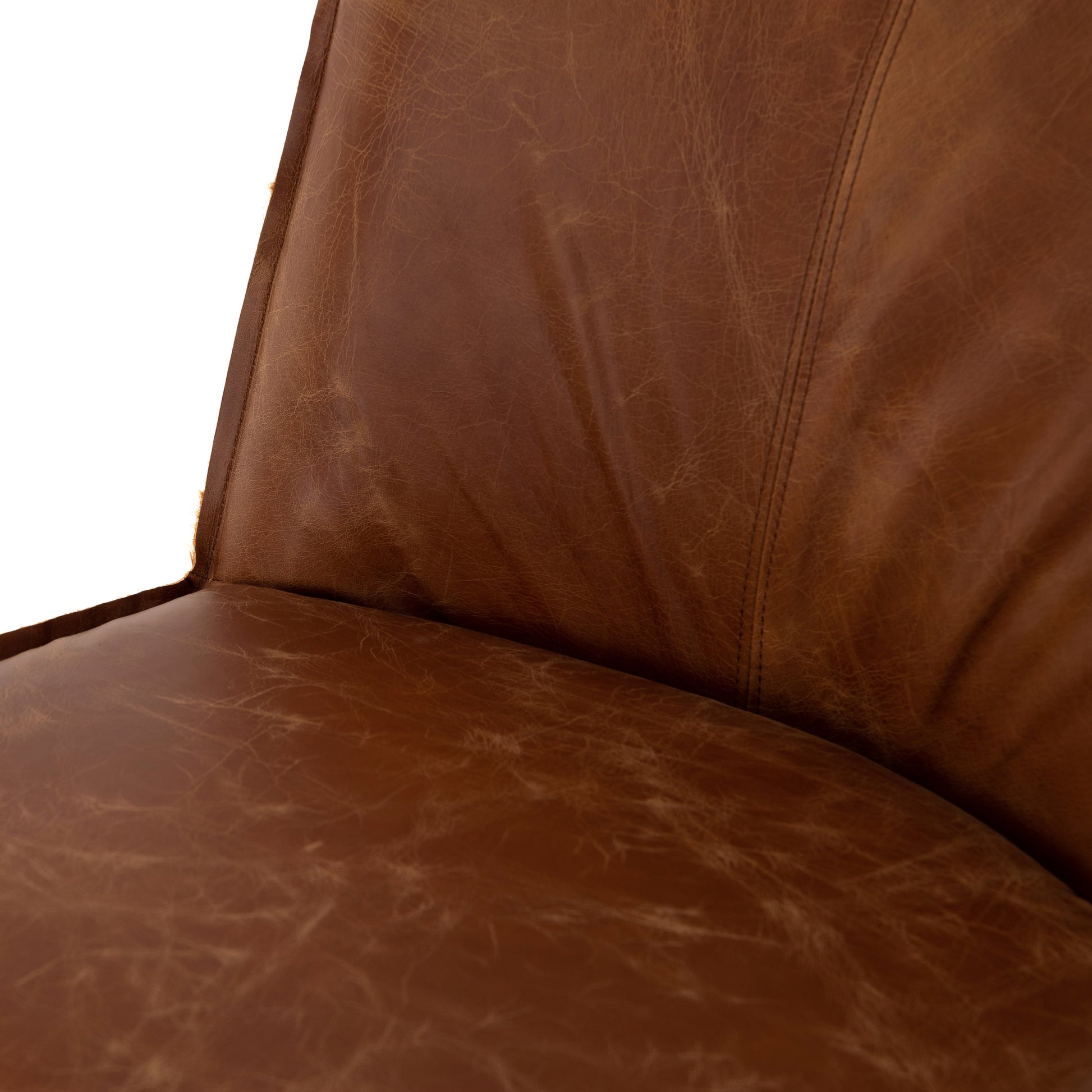 Aria Dining Chair by Four Hands in sienna chestnut, warm nettlewood and sienna chestnut. Made from top grain leather, solid nettlewood, 100% polyester in a modern style.