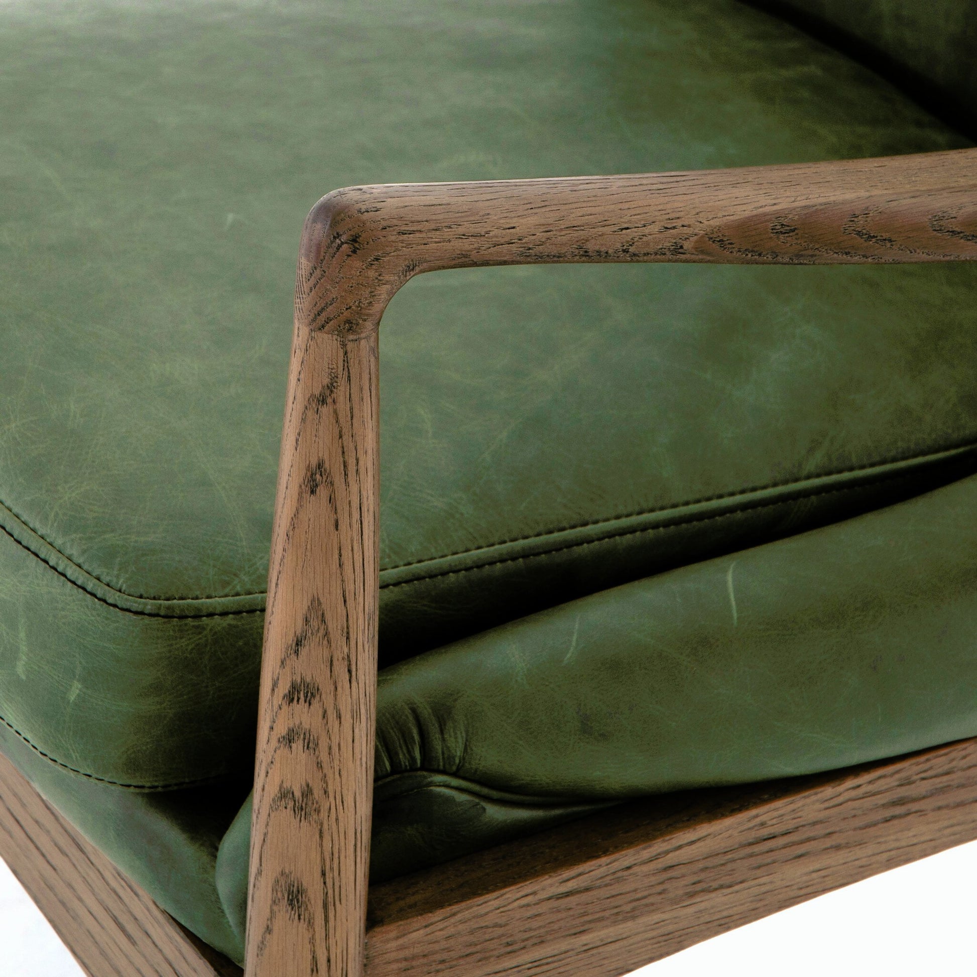 Braden Chair by Four Hands. Made from top grain leather, solid oak, 100% polyester in a modern style.